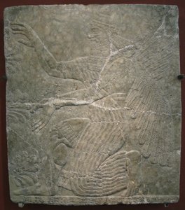 Bevingad gudom vid det heliga trädet. Relief från palatset Ashurnasirpal II i Kalhu, Nimrud, 900-talet f.Kr. av Assyrian