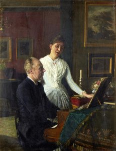 Skådespelaren Peter Jerndorff och hans fru Amalie vid pianot