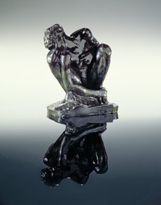 Hukande naken av Auguste Rodin