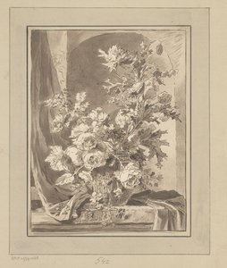 Vase med blommor till en nisch