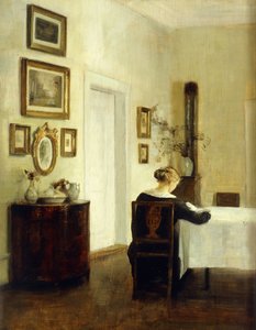 En kvinna vid ett bord i en interiör av Carl Holsoe