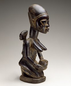 Mor och barnfigur, Nigeria, sent 1800-tal (trä och spår av indigo)