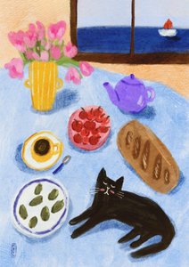 En avkopplande frukost vid havet med katten