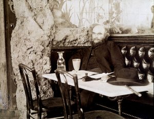 Verlaine i en bistro dricker absint