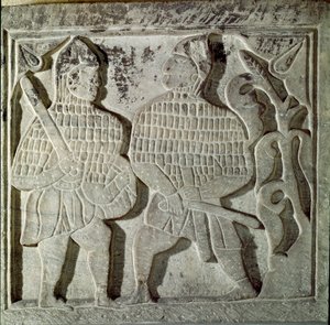 Seljukide Art (Seljukide eller Saljuqide): lågrelief som representerar två krigare. Från Konya, Turkiet. 1200-talet. Turkiskt islamisk konstmuseum, Istanbul