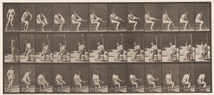 Tallrik 418. Toalett, sittande och strumpor, 1872-1885 av Eadweard Muybridge