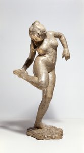Dansare tittar på fotsulan (gips) av Edgar Degas