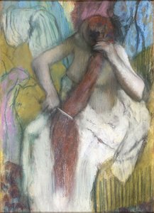 Kvinna som kammar sitt hår av Edgar Degas
