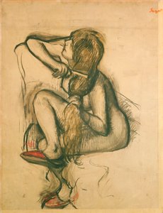 Kvinna som kammar sitt hår av Edgar Degas