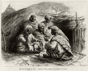 En köpman som fascinerar en kund, sittande på golvet, på en liten matta, han gör artikeln genom att hålla i en våg. Gravyr av Riou, för att illustrera historien ""Från Niger till Guineebukten", av kapten Louis Gustave Binger (1856-1936), 1887-1889, i av Edouard Riou