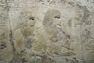 Egyptisk antikvitet: basrelief som representerar gästerna vid en begravningsbankett - Vizier Ramoses grav (18:e dynastin) - Luxor, Thebe, ädlarnas grav Egypten - Egyptisk civilisation: Basrelief föreställande gästerna vid en begravningsbankett, från graven av Egyptian 18th Dynasty