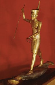 Tutenkhamun stående på en platt båt och kastande en harpun (förgyllt trä) av Egyptian 18th Dynasty