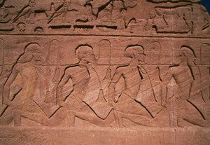 Nordens fångar, basrelief vid foten av jättarna i Ramses II:s stora tempel, Abu Simbel (UNESCO:s världsarvslista) av Egyptian 19th Dynasty