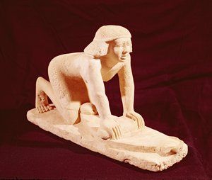 Modell av en tjänare som maler säd, Old Kingdom, från Saqqara