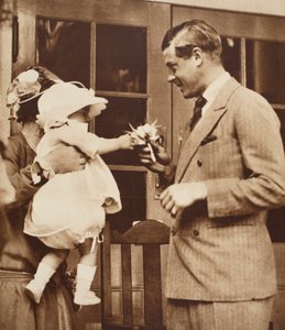 Ett barn ger kung Edward VIII en bukett i Enham Village Centre, 1926 av English Photographer