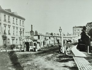 Kilburn Toll Gate vid södra änden av Kilburn High Road vid korsningen av Kilburn Priory, Camden Libraries, 1875 av English Photographer