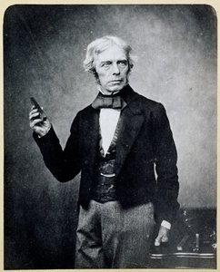 Michael Faraday (1791-1867) håller i en barmagnet, av Maull och Polyblank av English Photographer