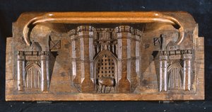 En misericord som föreställer Sir Yvains häst instängd när porten till en utstuderad slottsingång sänks, New College Chapel, Oxford, sent 1300-tal (trä)