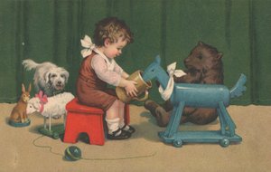 En ung pojke sitter och leker med sina leksaker i en barnkammare av English School