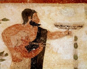 En skäggig man presenterar en kopp, nära honom en musiker (Detalj av fresk, 530 f.Kr.) av Etruscan