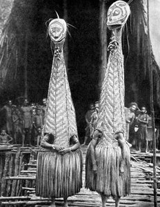 Goblinmasker och visir som bärs som skönhetshjälpmedel, Papua, Nya Guinea, 1936. av Fox Photos
