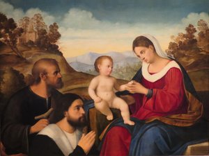 Den heliga familjen med en givare i ett landskap av Francesco Bissolo