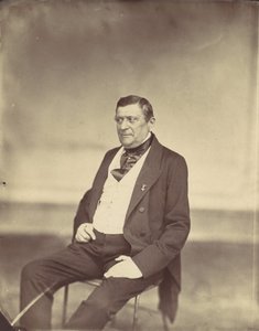 [Sittande man i vit väst och mörk rock], 1850-60-tal.