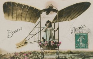 Nyårshälsningskort av en flicka i ett flygplan, 1913 (handfärgat foto) av French Photographer