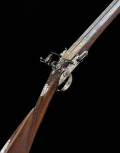 En fin och sällsynt 20-håls silvermonterad fransk D.B. Flintlock Sporting Gun, ca 1725 av French School