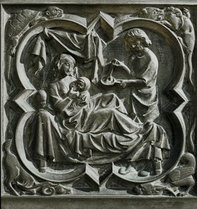 Adam lagar mat medan Eva, i sängen, tar hand om ett barn ... (relief) av French School