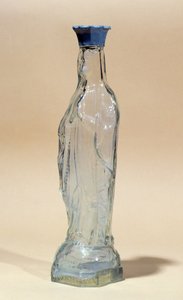 Lourdes vatten i en flaska i form av Jungfru Maria (glas) av French School