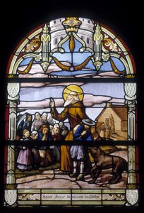 Saint Hervé välsignar de trogna - målade glasfönster i St Germain-kyrkan i Kerlaz av French School
