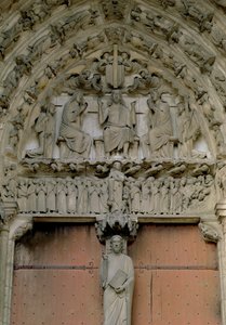 Södra portalens tympanon föreställande Kristus tronad med en Beau Christ-figur på trumeau nedan, 1100-talet av French School
