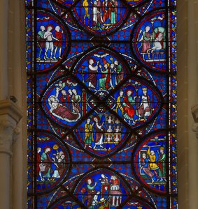 Målat glas i katedralen i Chartres: detalj av Saint Thomass liv av French School