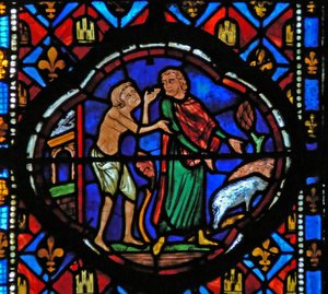 Window Ew-L som visar en scen från historien om den förlorade sonen: efter att ha spenderat alla sina pengar tar han hand om grisar och reflekterar över sin situation av French School