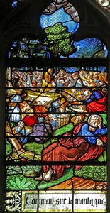 Fönster w12 som visar en detalj från Miracle of the Feeding of the 5000 av French School
