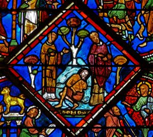 Fönster w15 som visar en scen i det barmhärtige samaritens fönster: pilgrimen ignoreras av en präst och en Levi av French School