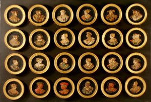 En samling av tjugofyra tecknare som porträttmedaljonger (färgad gesso duro applicerad på träslipad) av Friedrich (after) Hagenauer