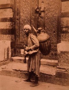 En egyptisk vattenbärare (sepiafoto)
