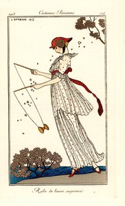 Kvinna i klänning av tryckt linne som spelar diabolo av Georges Barbier