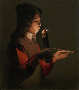 En ung pojke med en pipa, som blåser på en brandbrand, av La Tour, Georges, de (1583-1652). olja på duk av Georges de La Tour