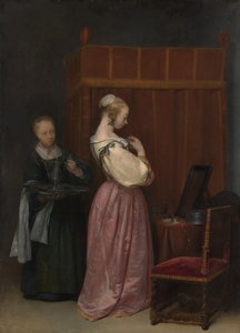 En ung kvinna på hennes toalett med en hembiträde, ca. 1650-51.