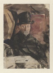 Sittande man med hög hatt på ett café