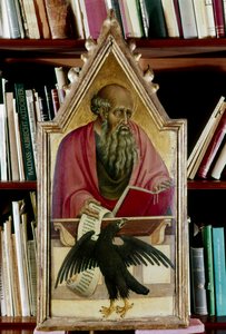 Evangelisten Johannes visas med sin symbol, en örn, 1400-talet