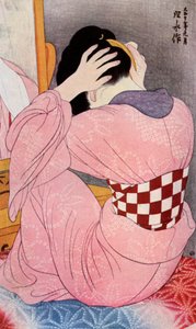 En japansk kvinna som klär sitt hår, 1920-talet 1930.
