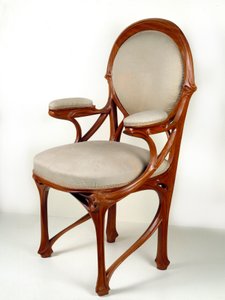 Art Nouveau: Amerikansk fåtölj i valnöt