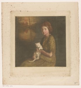Flicka med en katt i knäet