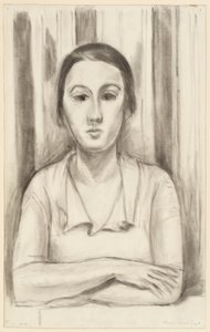 En kvinna lutar sig med armbågarna på ett bord av Henri Matisse