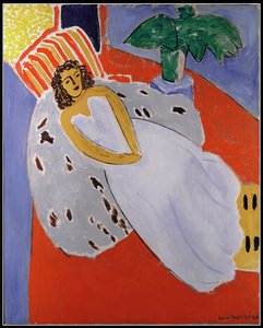 Ung kvinna i vitt, röd bakgrund av Henri Matisse
