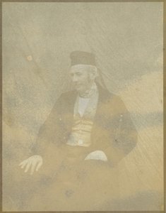 [Porträtt av en sittande man i keps] av Hippolyte Bayard